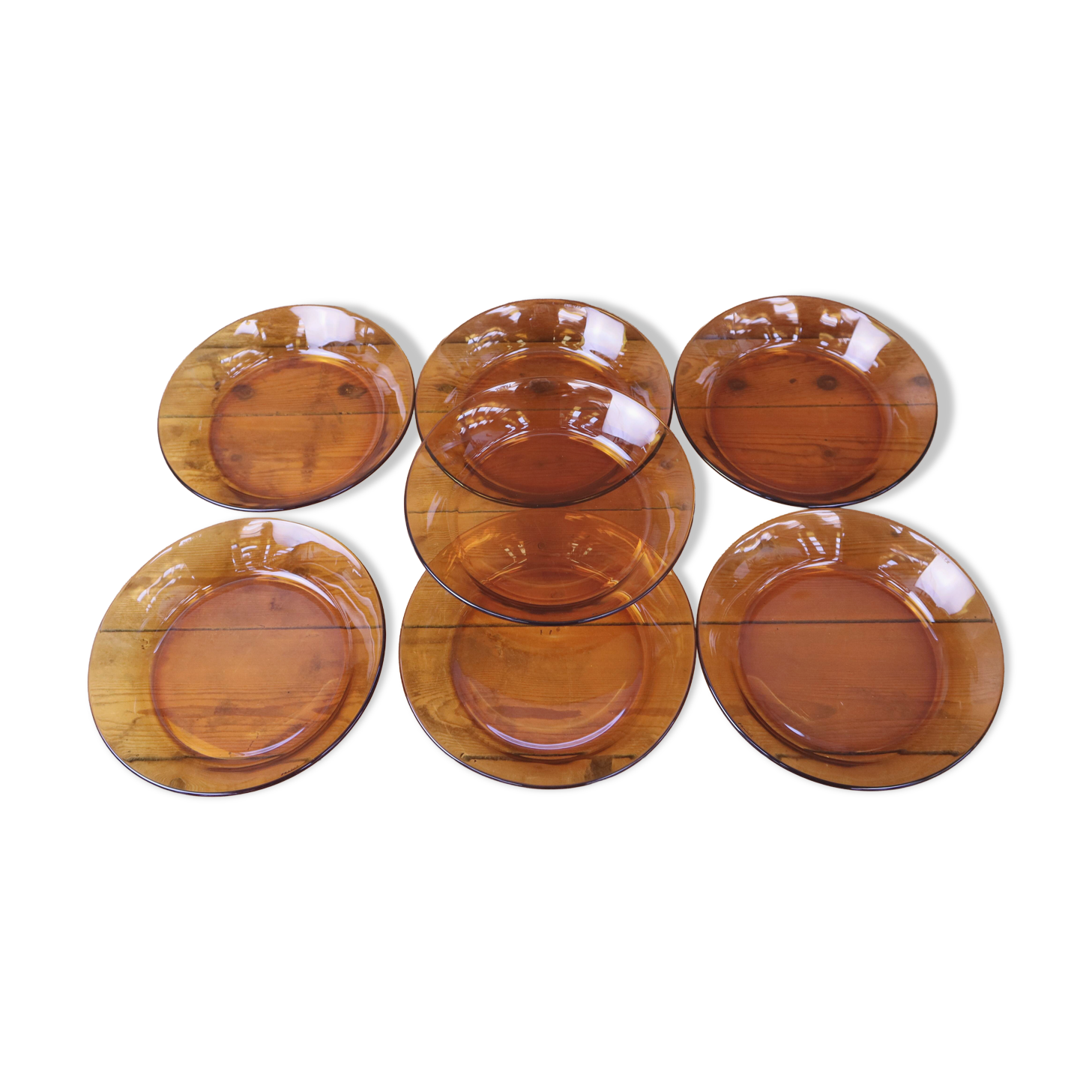 Set of 7 amber Duralex deep plates.