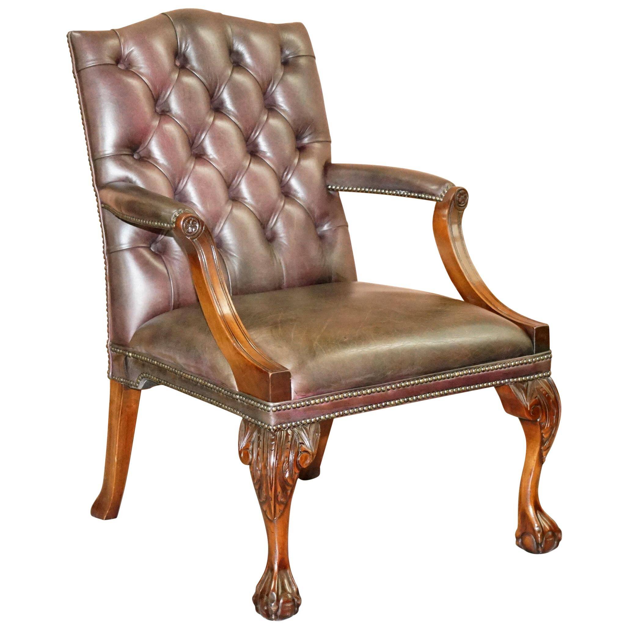 Gainsborough armchair George II leather Chesterfield hand-carved with claw and ball feet.