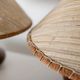 Lot of 2 vintage table lamps from the 1970s, dark wood oval bases with curved brass details, handmade natural fibre lampshades, elegant lighting.
