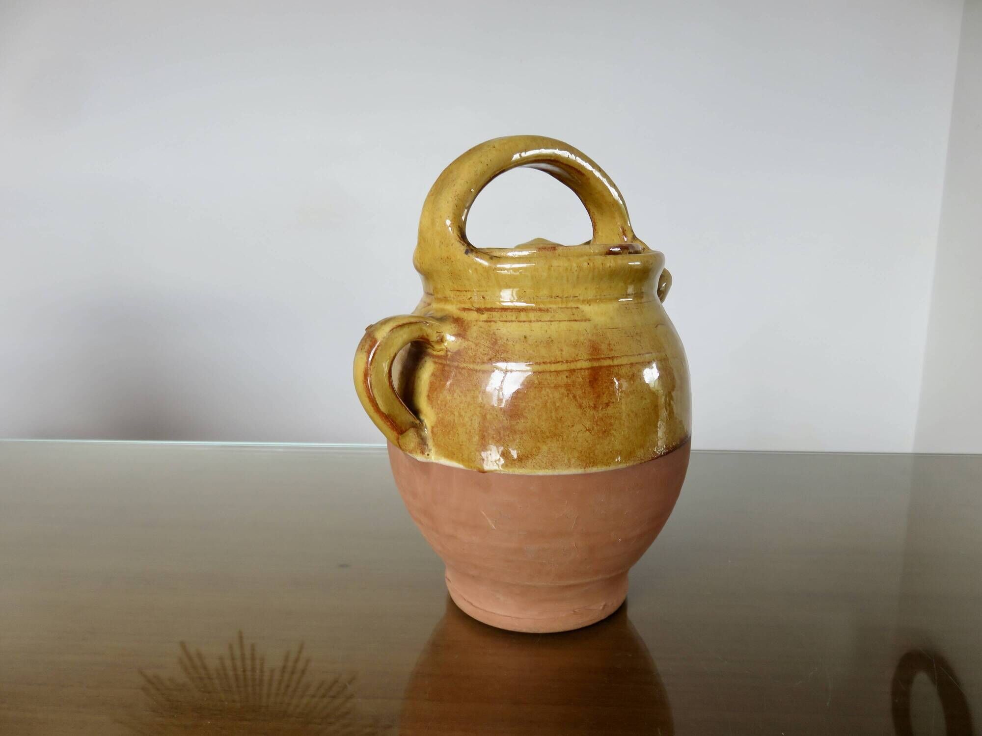 Glazed yellow terracotta jug, south-west of France.