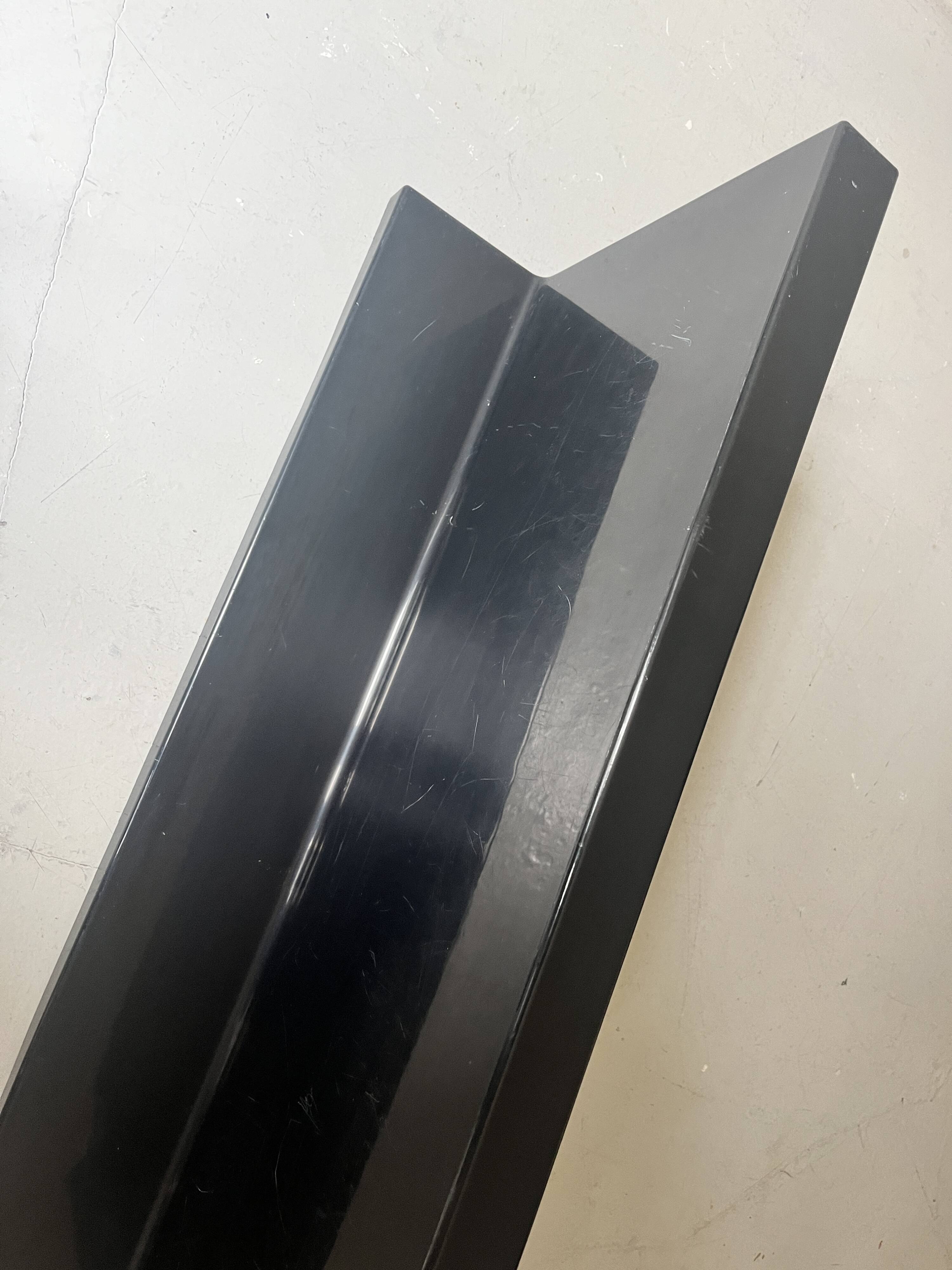 Large black magazine rack by Giotto Stoppino for Kartell, Italy 1970.