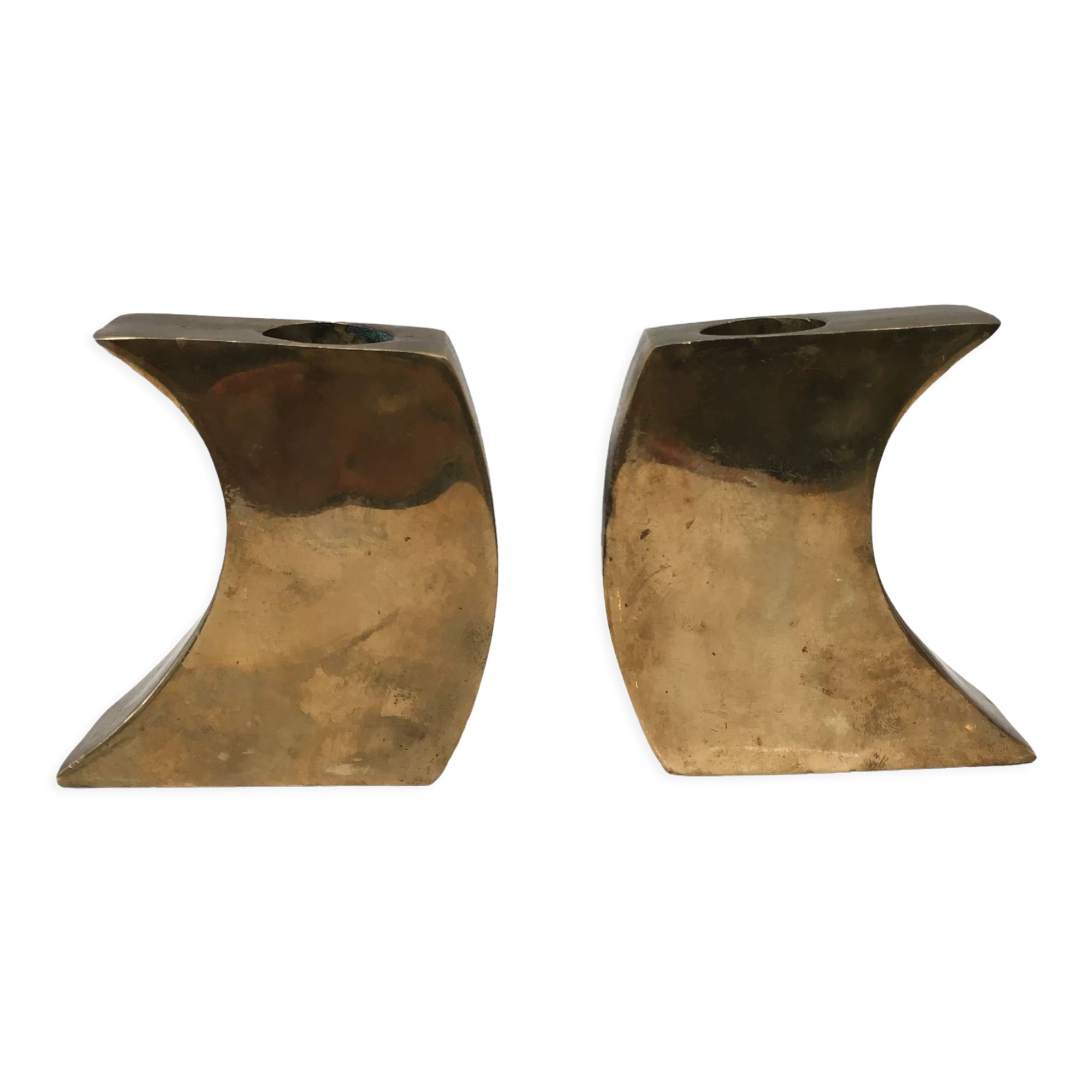 Pair of bronze candle holders by Monique Gerber