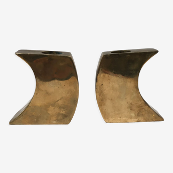 Pair of bronze candle holders by Monique Gerber