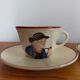 Vintage saucer cups in Breton earthenware