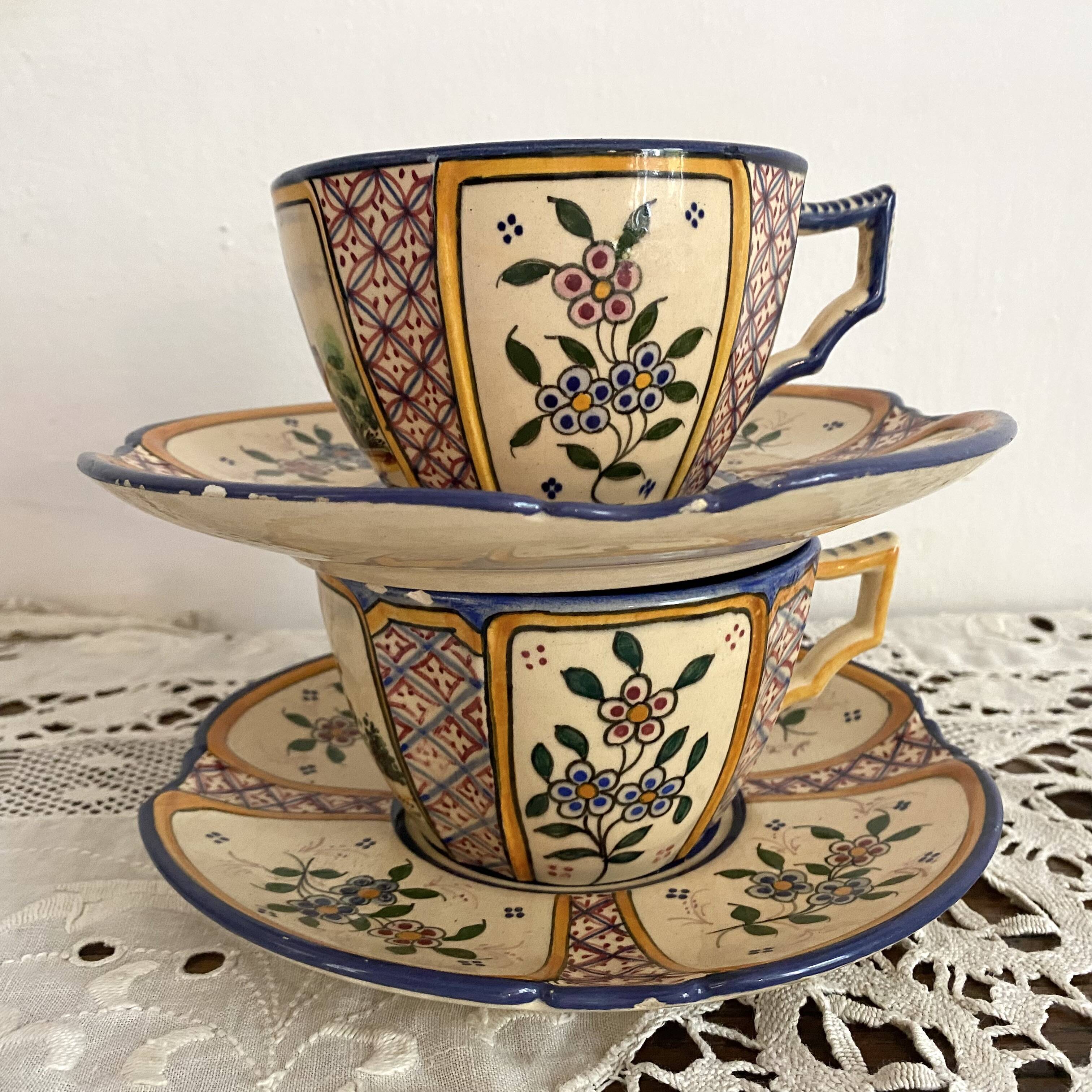 Antique Quimper Henriot earthenware cups and saucers