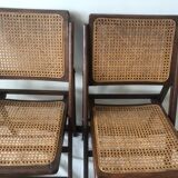 Pair of folding chairs in cane and dark wood