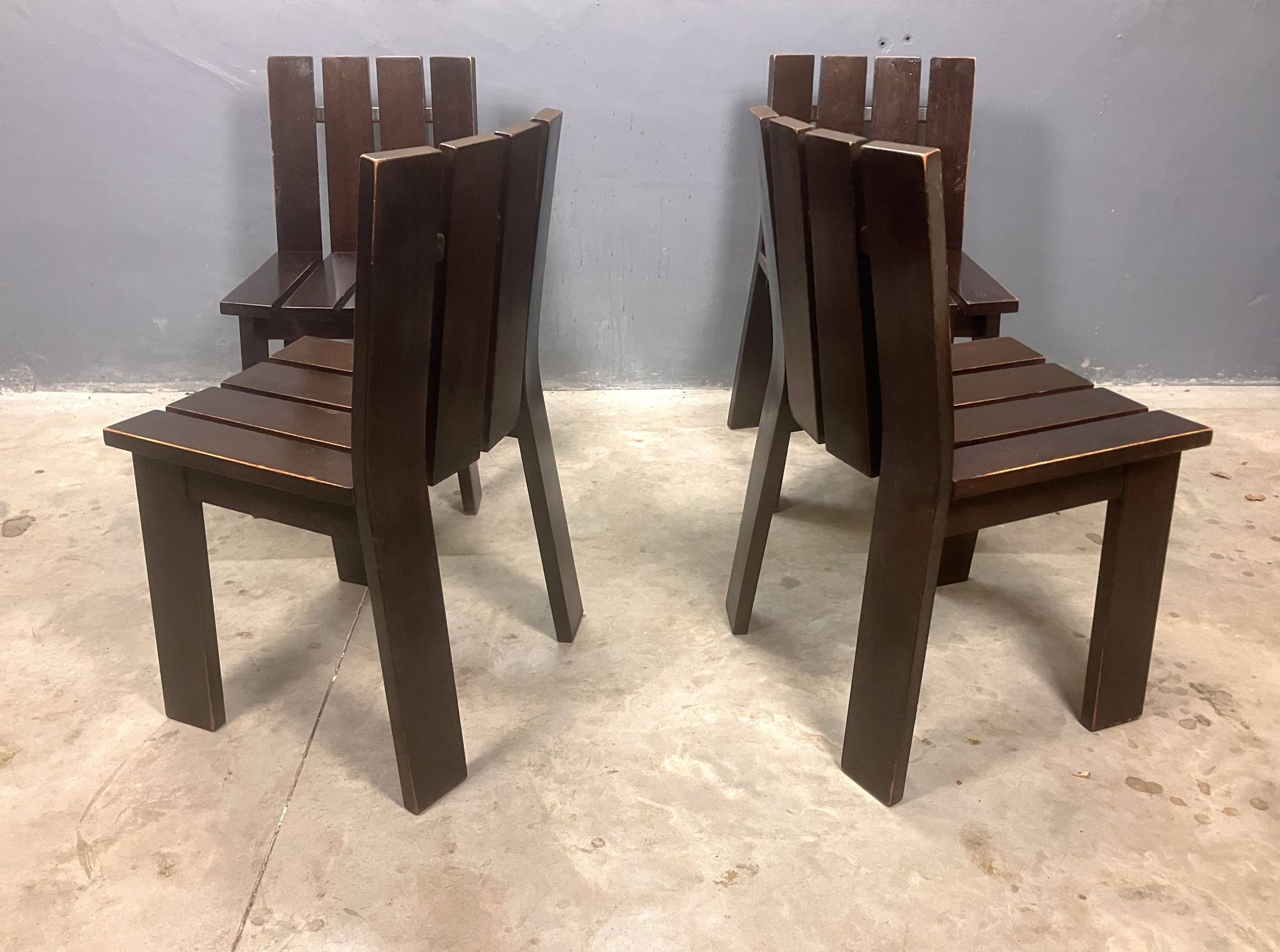 Brutalist and modernist dining chairs from the 1970s in architectural brown wood.