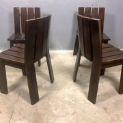 Brutalist and modernist dining chairs from the 1970s in architectural brown wood.