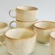 Set of 9 speckled ceramic coffee cups