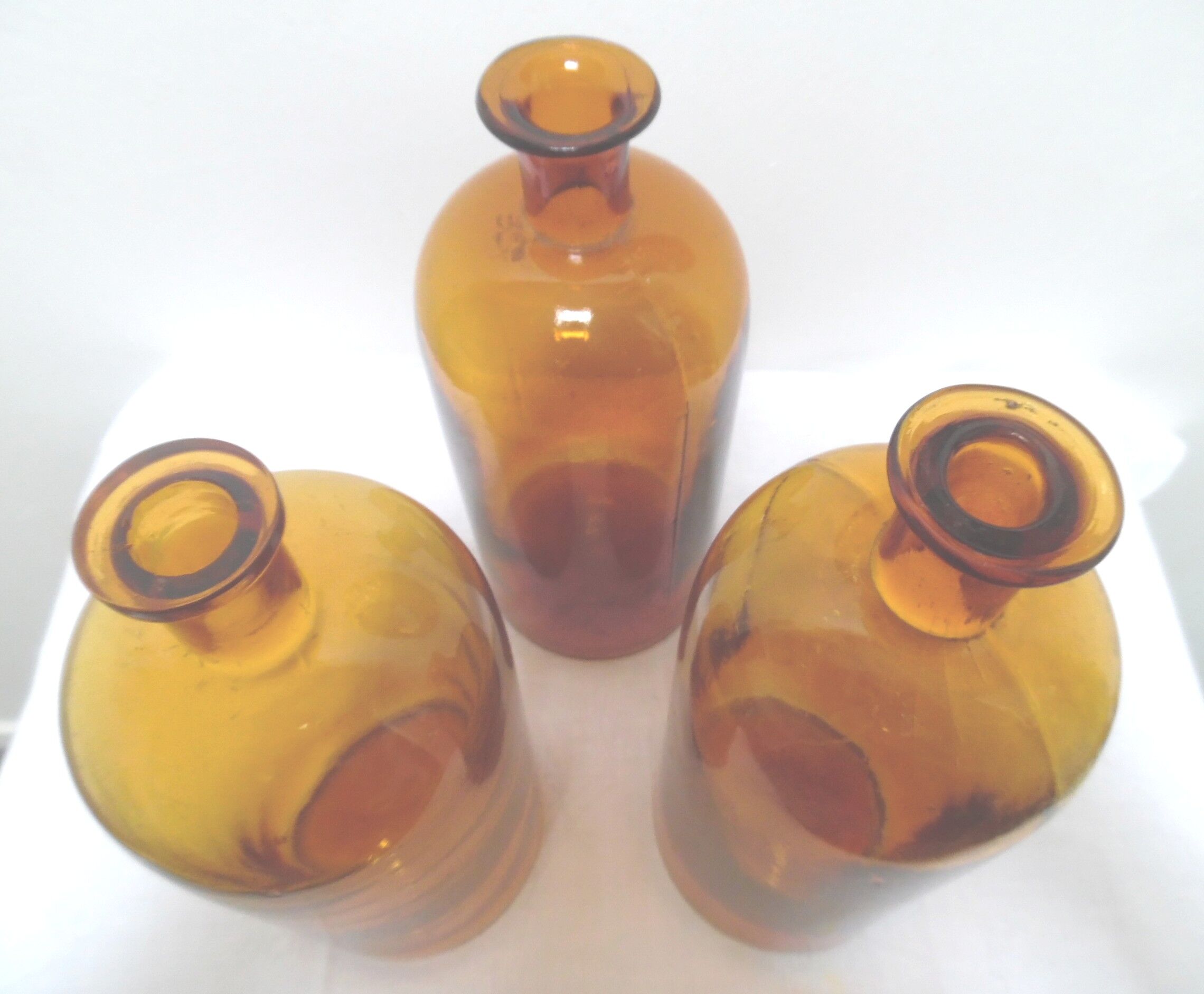 Trio pharmacy bottles