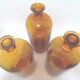 Trio pharmacy bottles
