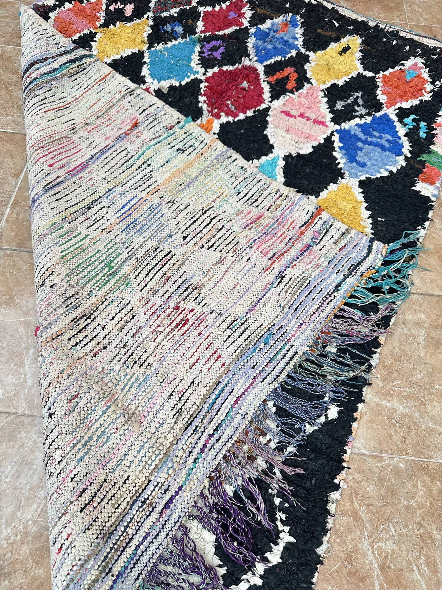 Vintage Boucherouite Berber rug: Hand-knotted Moroccan rug.