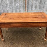 Antique solid cherry farmhouse table with 2 end drawers and 1 pull-out.
