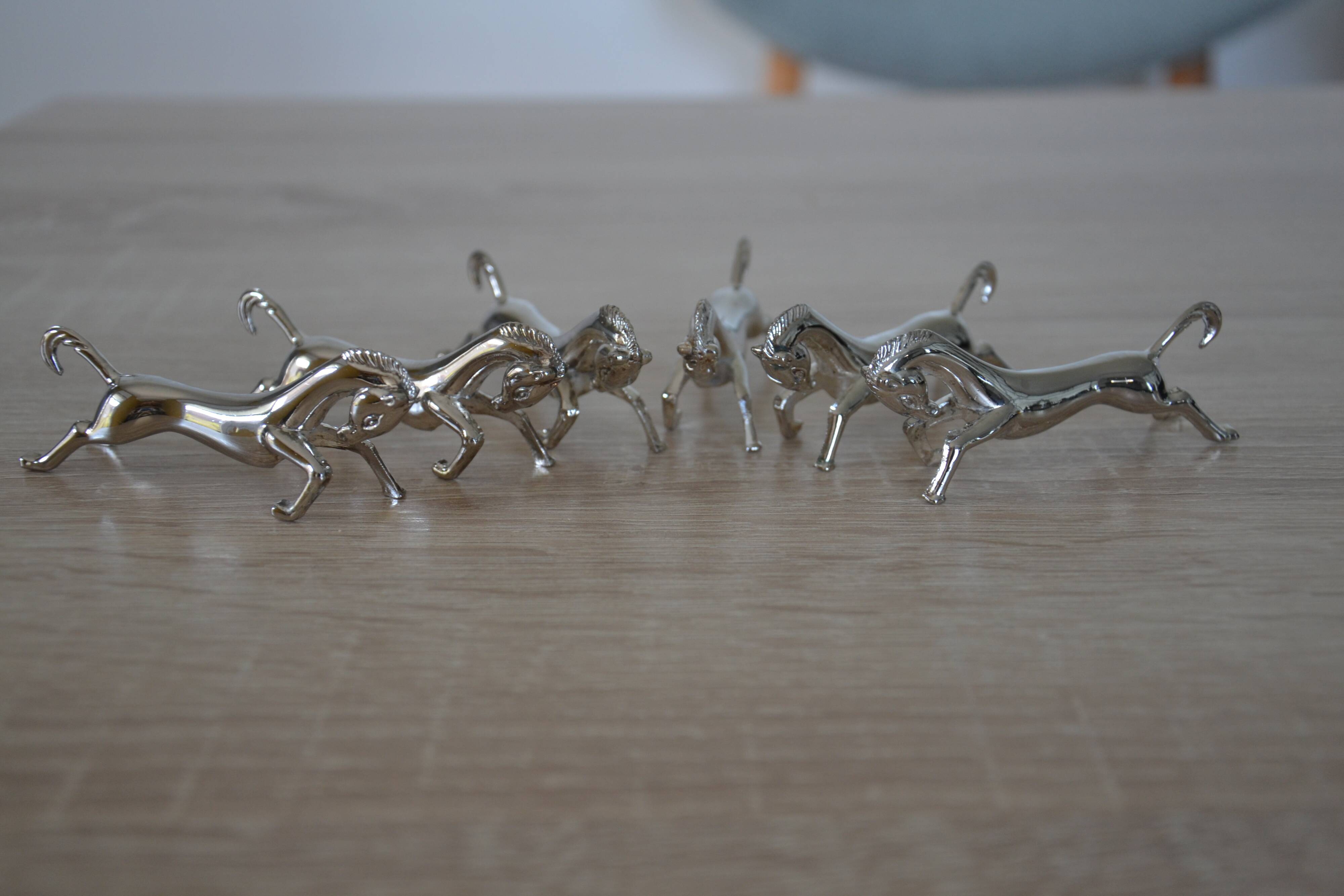 6 silver-plated "horse" knife rests