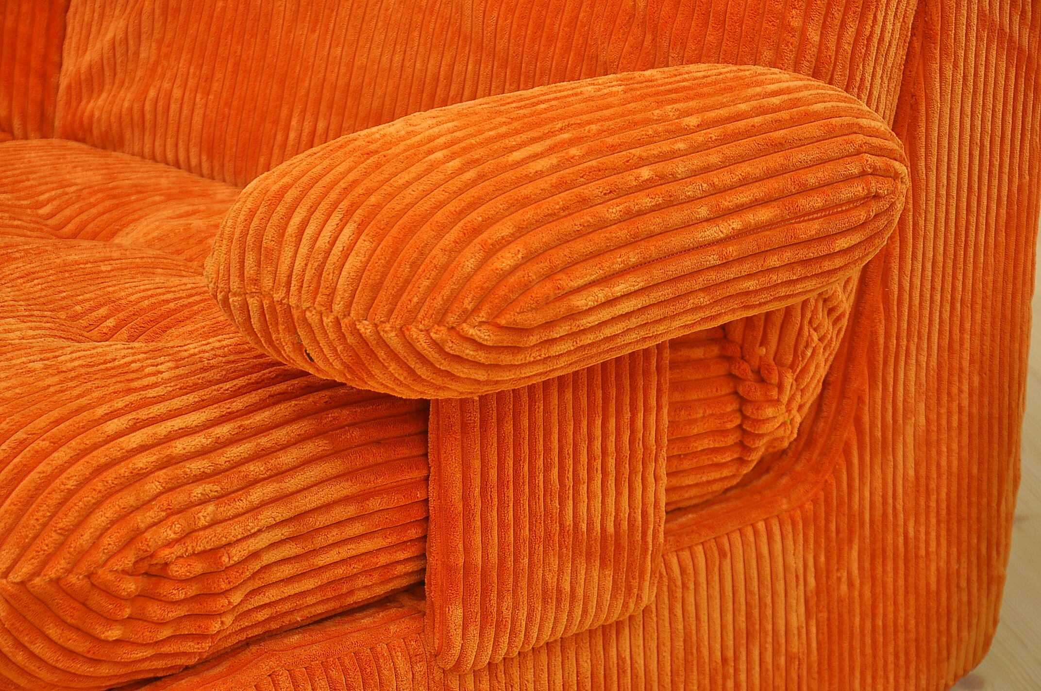 Orange corduroy modular sofa, 1970s.