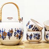 4 tea cups with delicate floral pattern