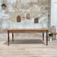 Vintage farmhouse table with turned legs.