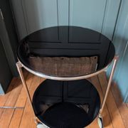 Vintage side table on wheels – black glass top
