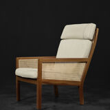 Mid-century modern Scandinavian mahogany armchair with French wicker by Bernt Petersen.