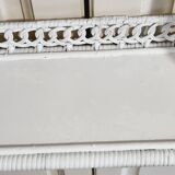 White woven wicker shelf