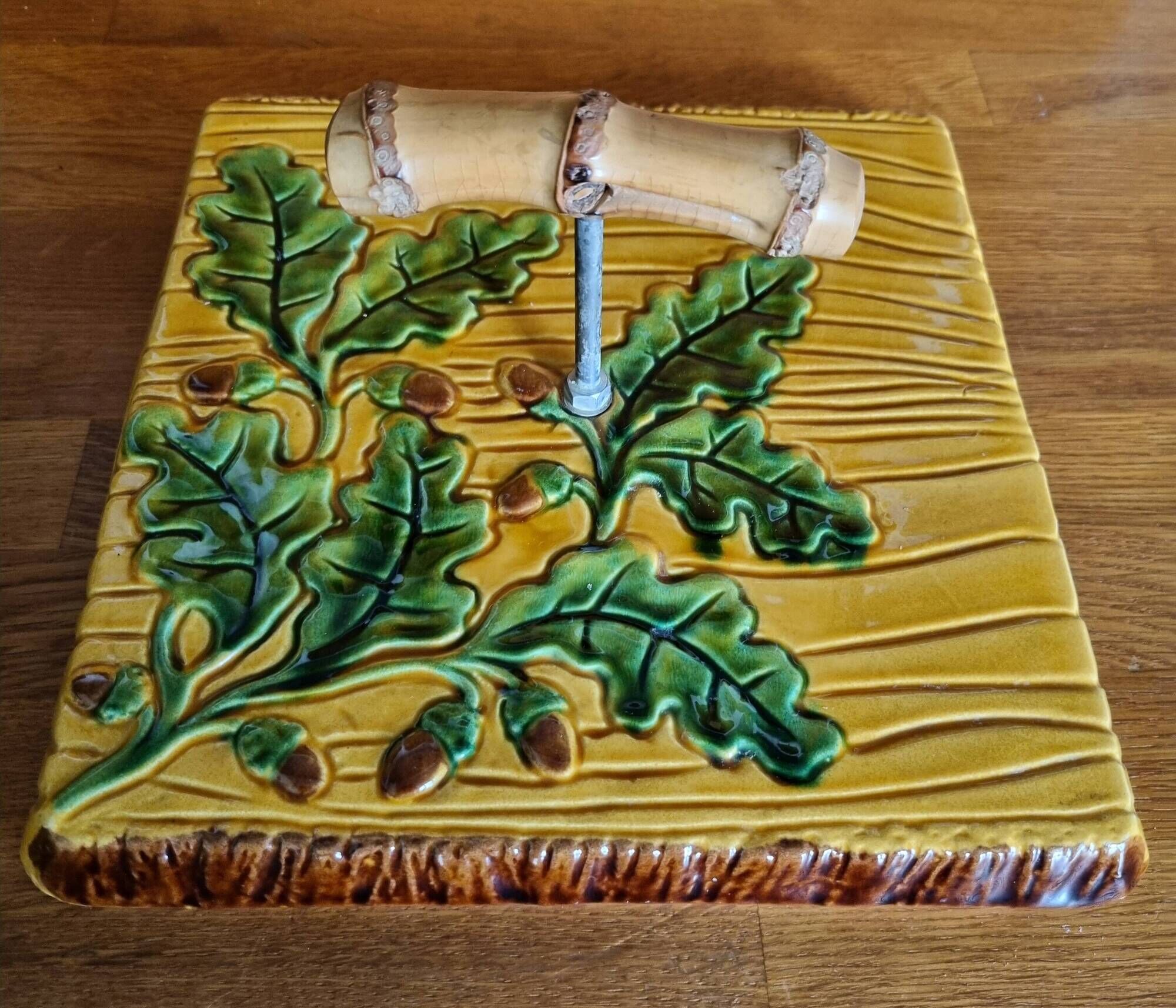 Vintage cheese platter Vallauris with wood and oak leaf pattern.