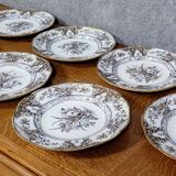 Set of 6 plates plus 1 in English porcelain, early 20th century