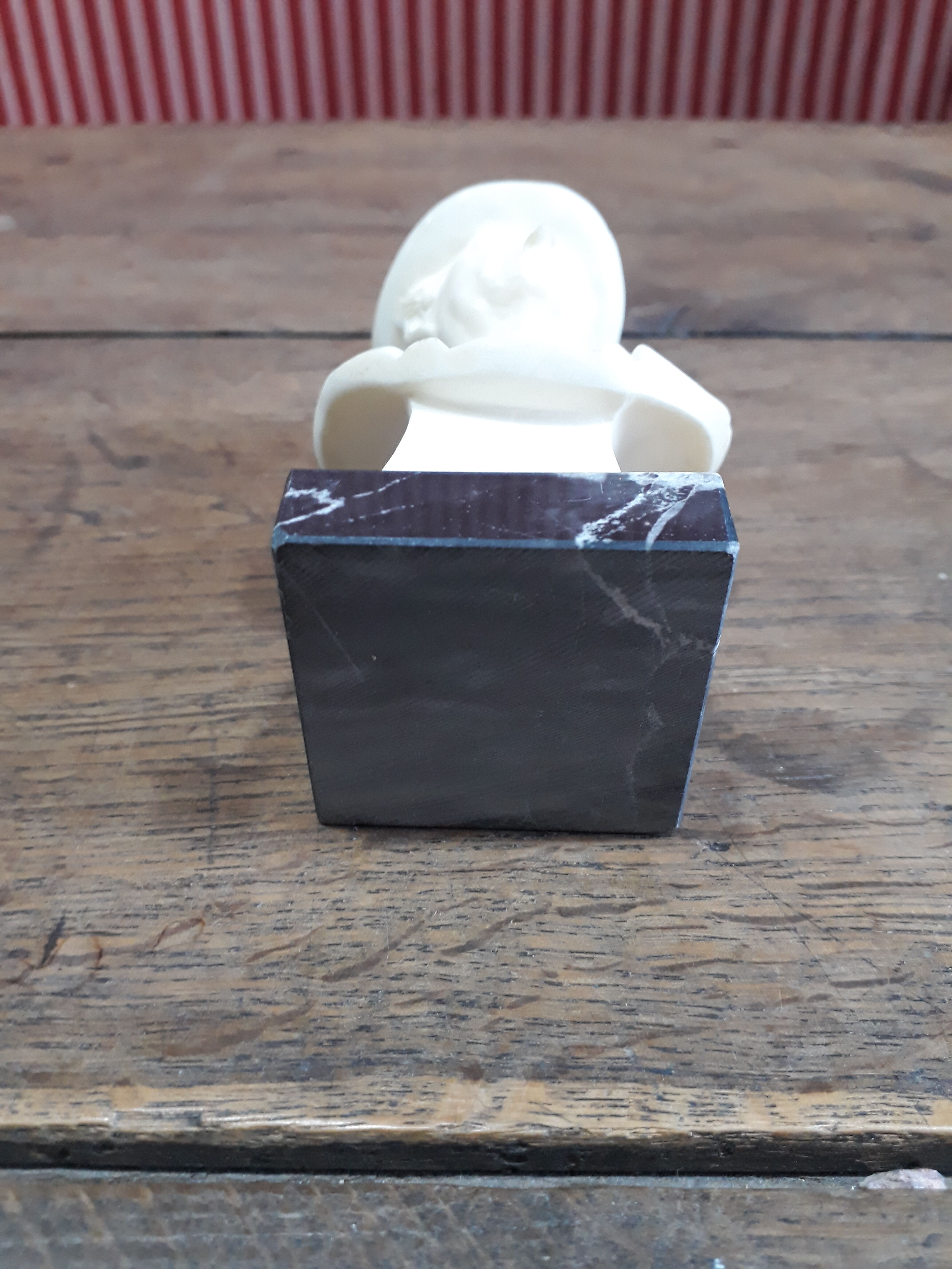 Resin bust by Puccini, marble base