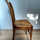 19th century straw chair with carved peacock back