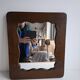 Czechoslovakian wall mirror with a wavy wooden frame, mid-century, 1940s