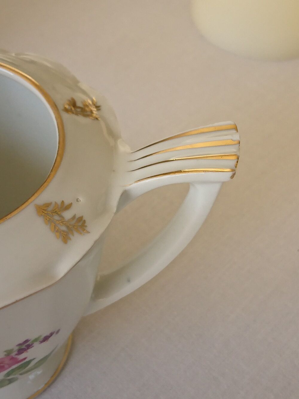 Sugar bowl and milk jar in flowery white porcelain