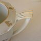 Sugar bowl and milk jar in flowery white porcelain