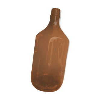Brown smoked glass bottle with vintage deco cove