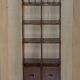 Pair of open bookshelves in crocodile leather with drawers and compartments.