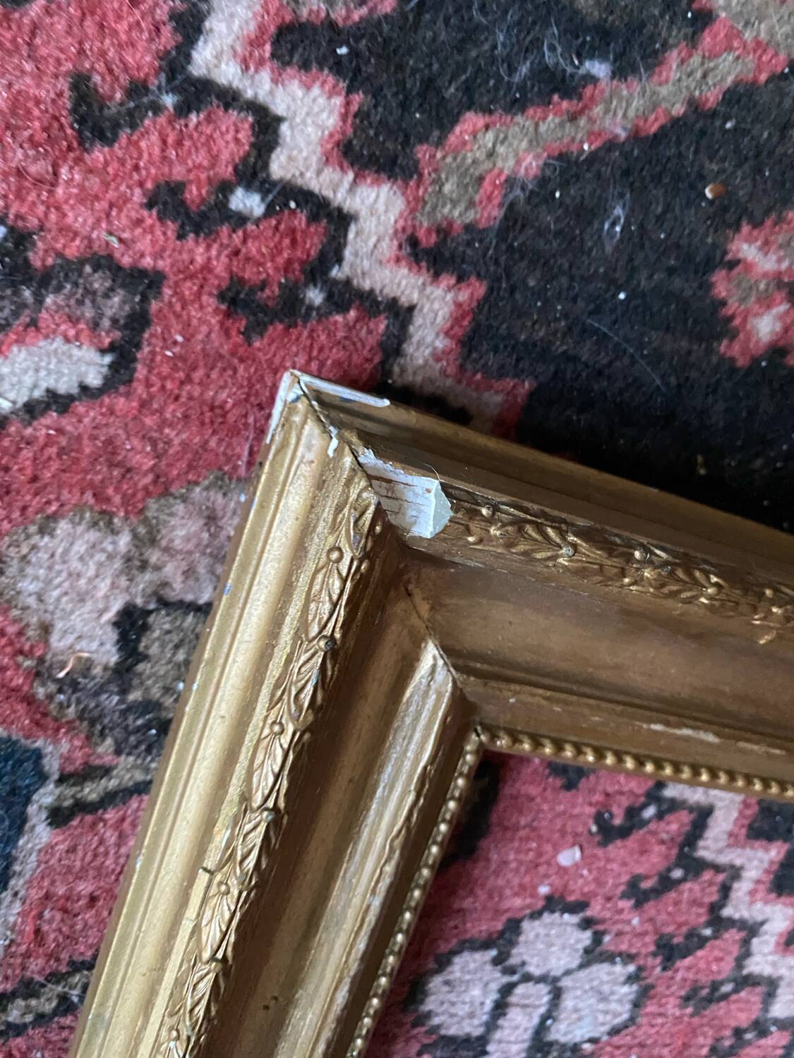 Old gilded wood frame.