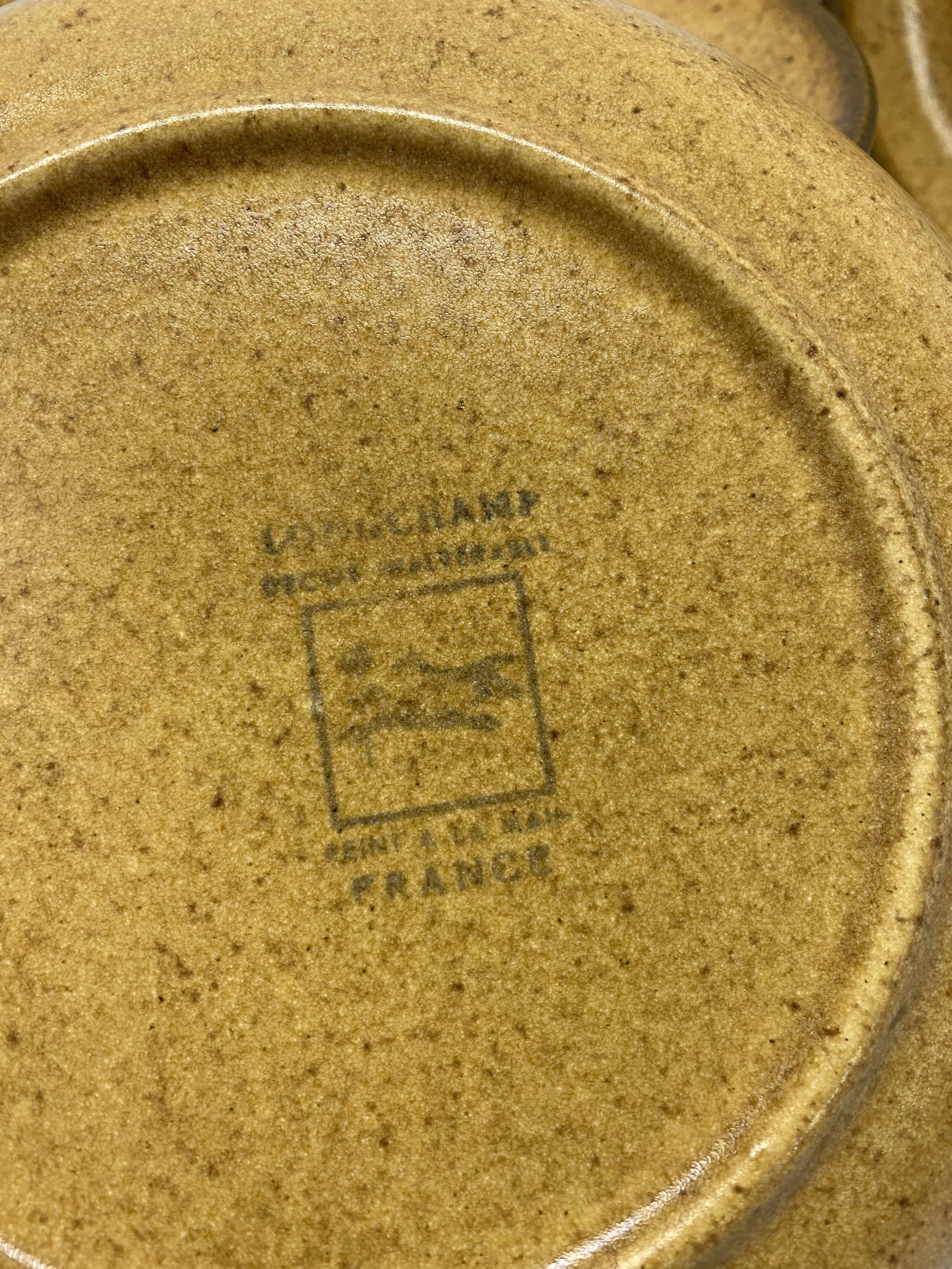 Set of 10 Longchamp sandstone plates