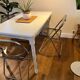 Farm table with a cream patina.