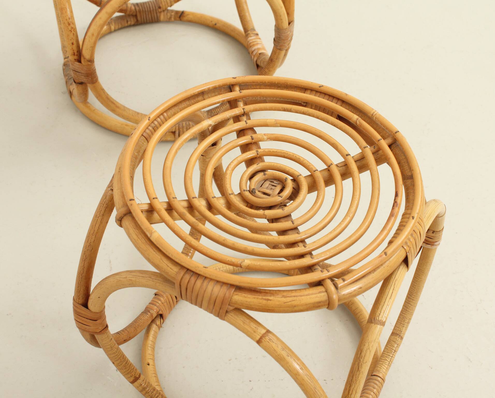 Set of three 1970s rattan stools, Spain.