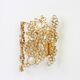 Pair of wall sconces in gilded brass and crystal by Palwa, Germany, 1960s.