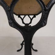 Bistro table with an oak top on a cast iron base, 1930s.