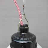 Trio of opal glass and bakelite globe pendant lights