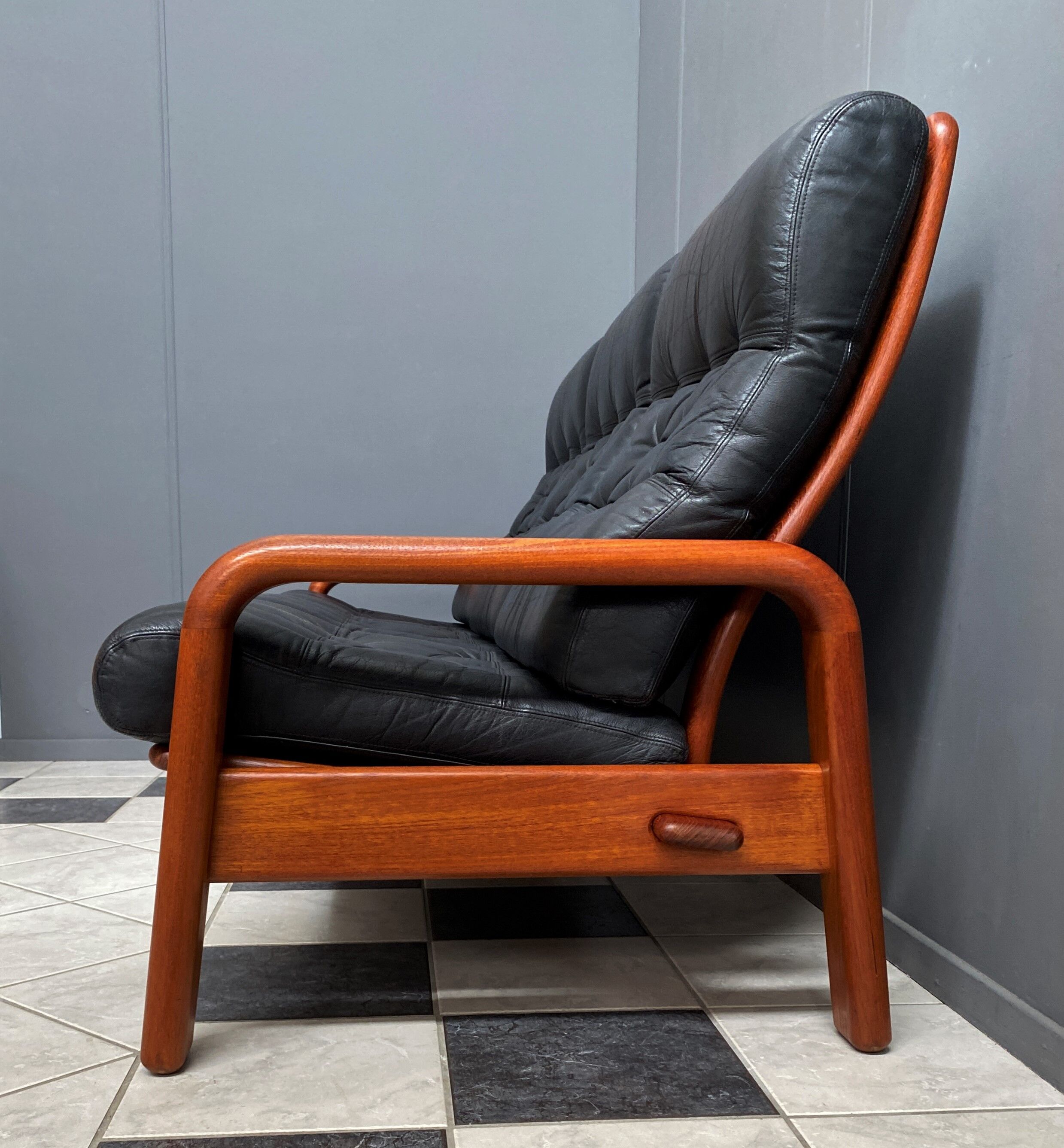 Teak and Black Leather 32 seat sofa by HS Denmark 1970s