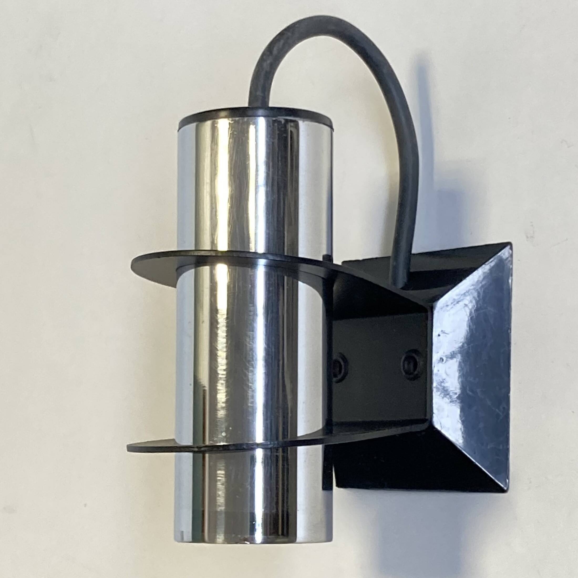 Pair of Targetti Sankey chrome wall lights. 1970s. Italy