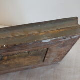 Painting on old panel framed and signed, cow and farmer