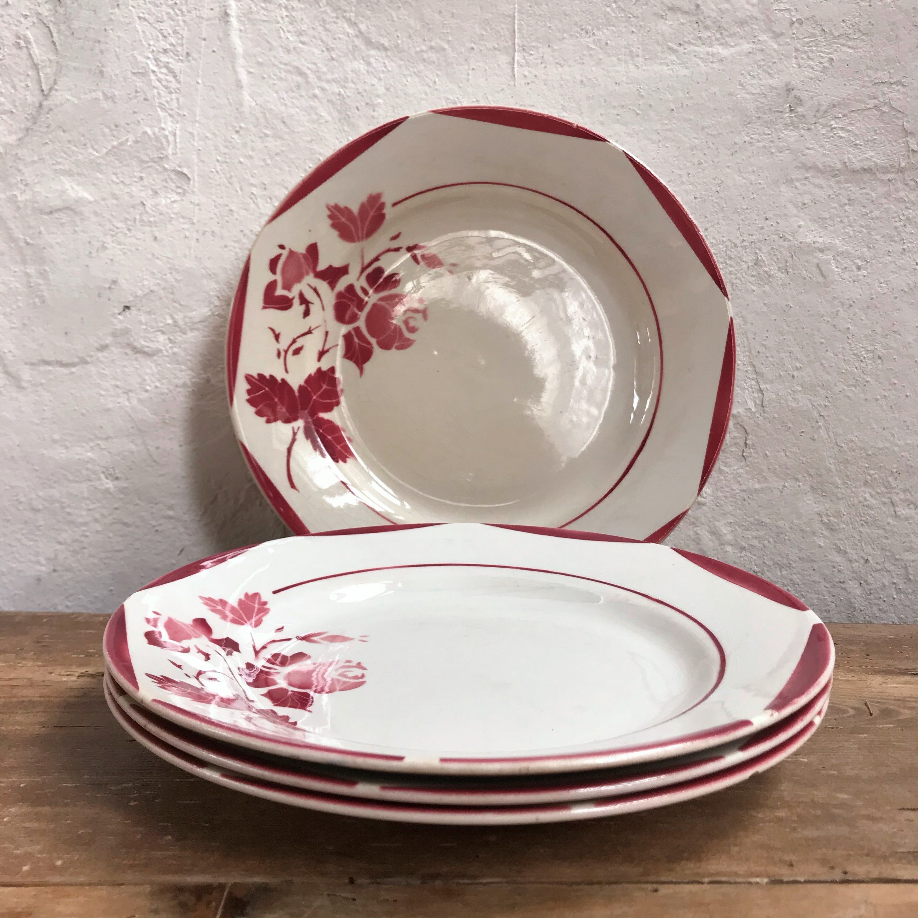 Four Gien porcelain plates