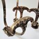 Four patères bronze patinated leafy décor early 20th century