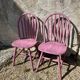 Pink slatted chairs
