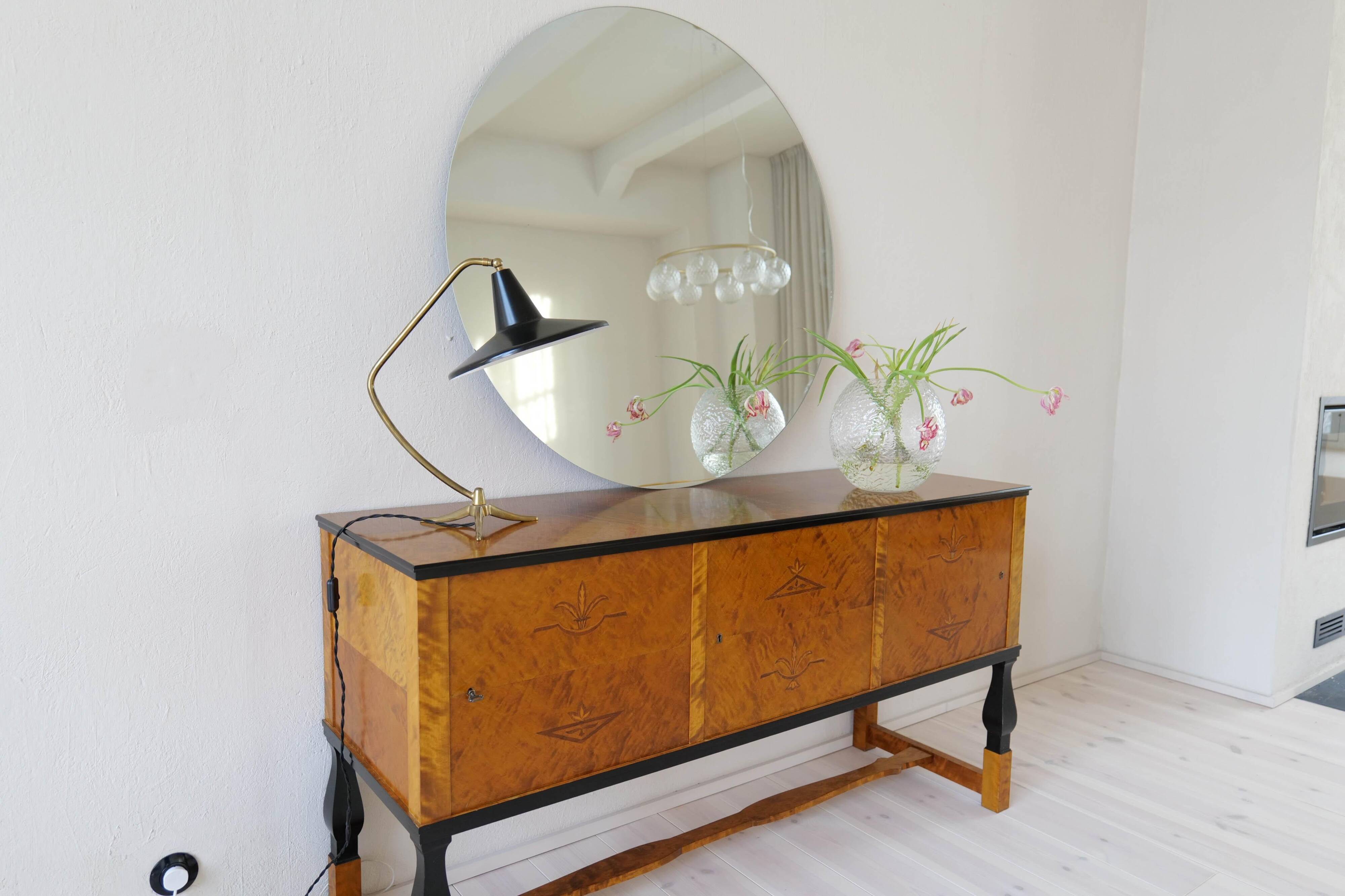 Brass table lamp on a tripod in modern Swedish style, Sweden, 1950.