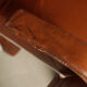 Pair of sculptural cognac leather armchairs, 1970s