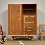 Rattan wardrobe with tapered legs from the 1960s.