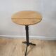 Black and wood pedestal table